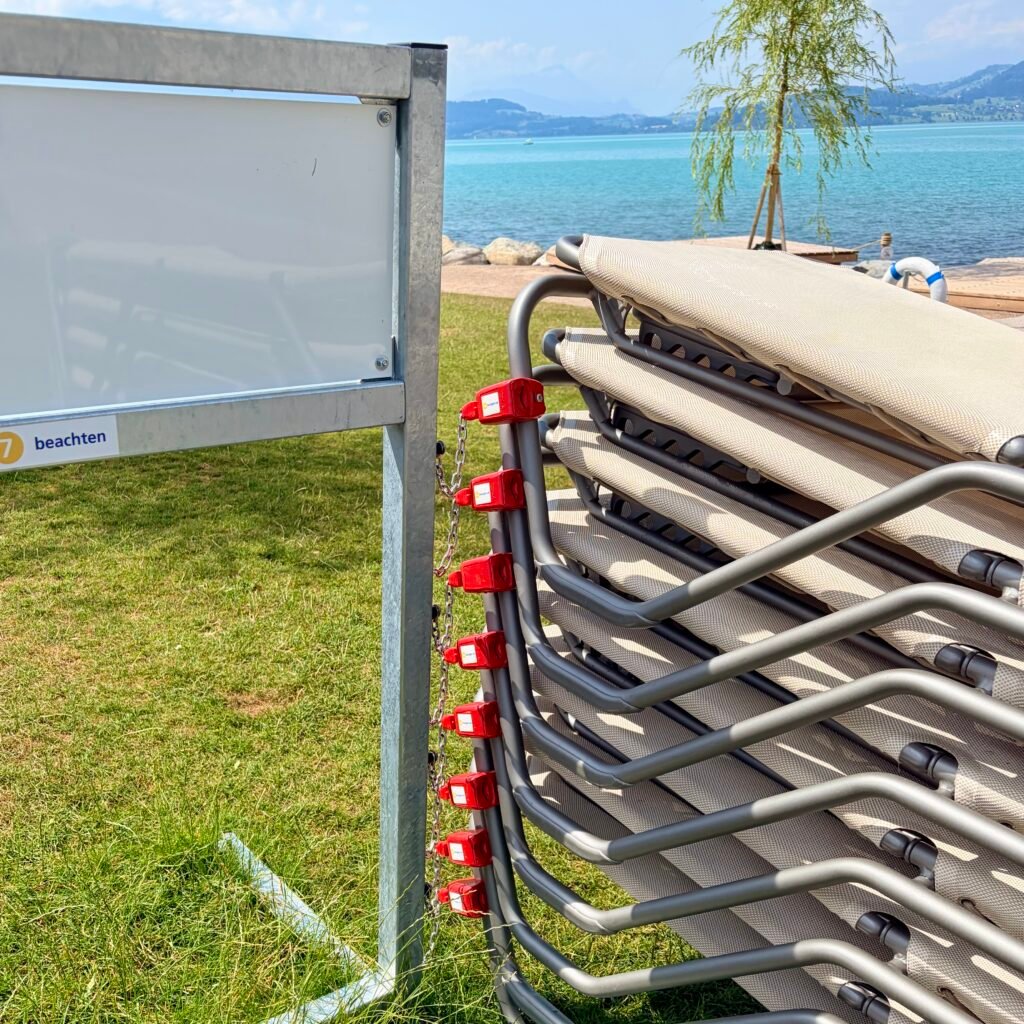Beach chairs for 2CHF coin deposit at Strandbad Zug Switzerland Family Guide