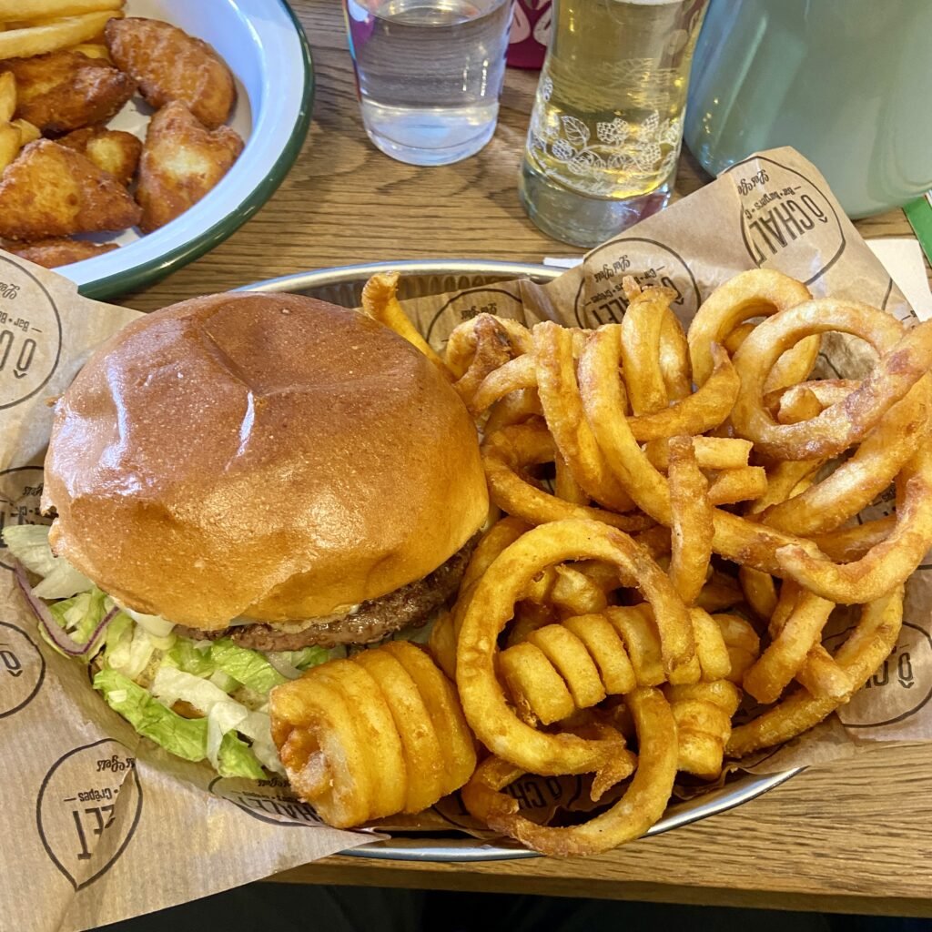 Raclette Burger with Curly Fries at Ô Chalet in Les Gets