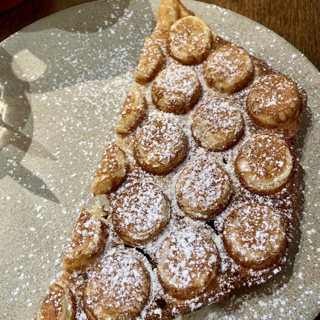 Fresh Waffle with Powdered Sugar from Claudie Coffee Shop in Les Gets