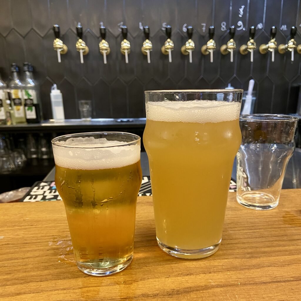 Bar Area with Beer in pints at Hops Micro Pub in Les Gets