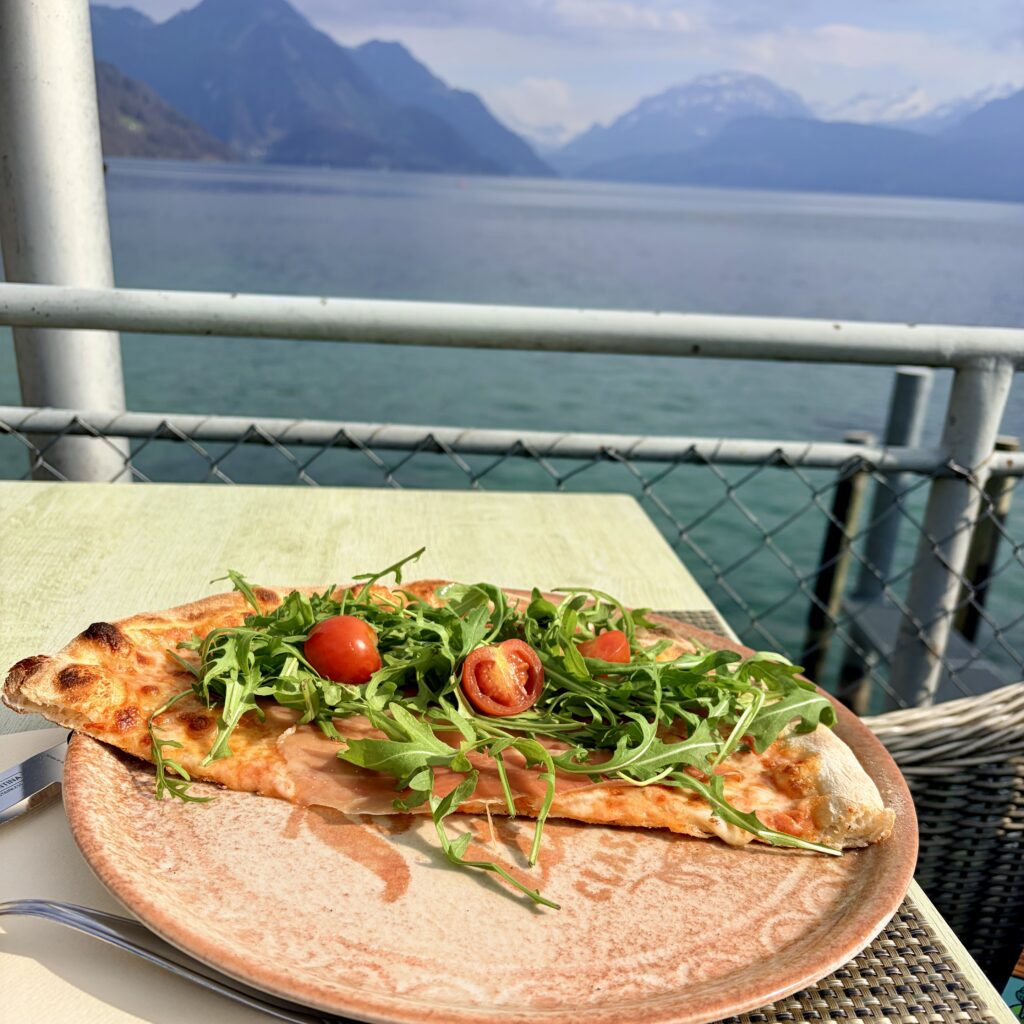 Pizza with a view of Lake Lucerne and Mountain Views from Seerestaurant Schlüssel