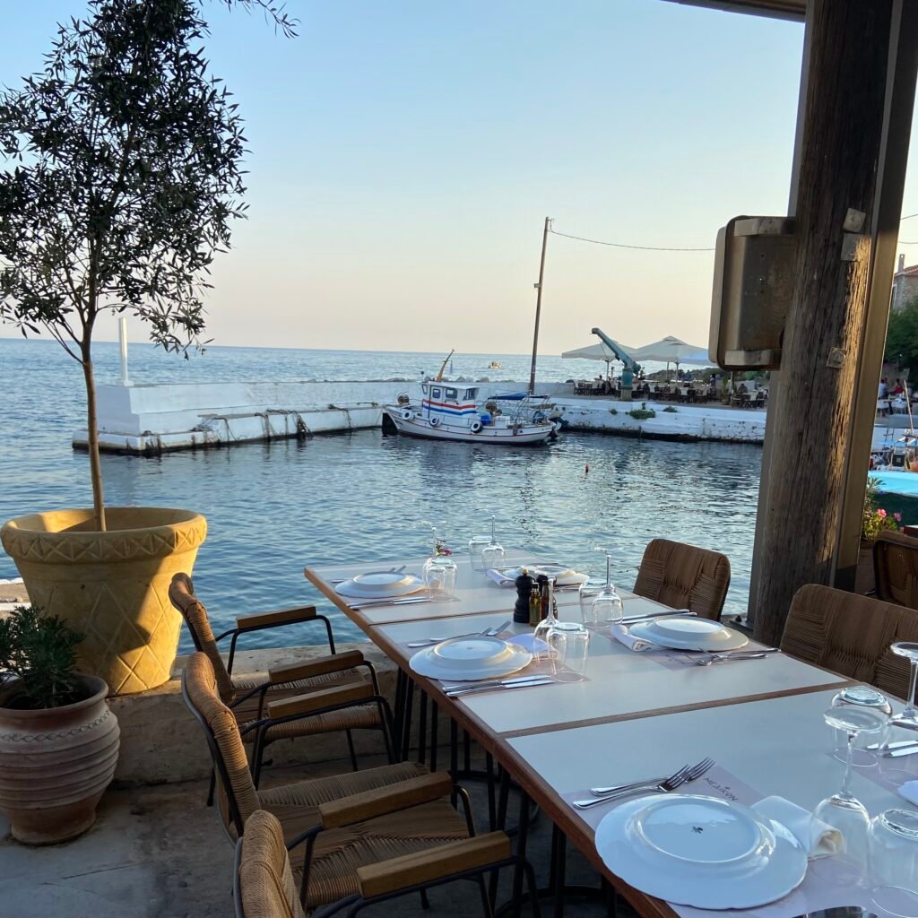 Outdoor dinning area next to port at Medikon in Agios Nikolaos in the Mani Peninsula Peloponnese
