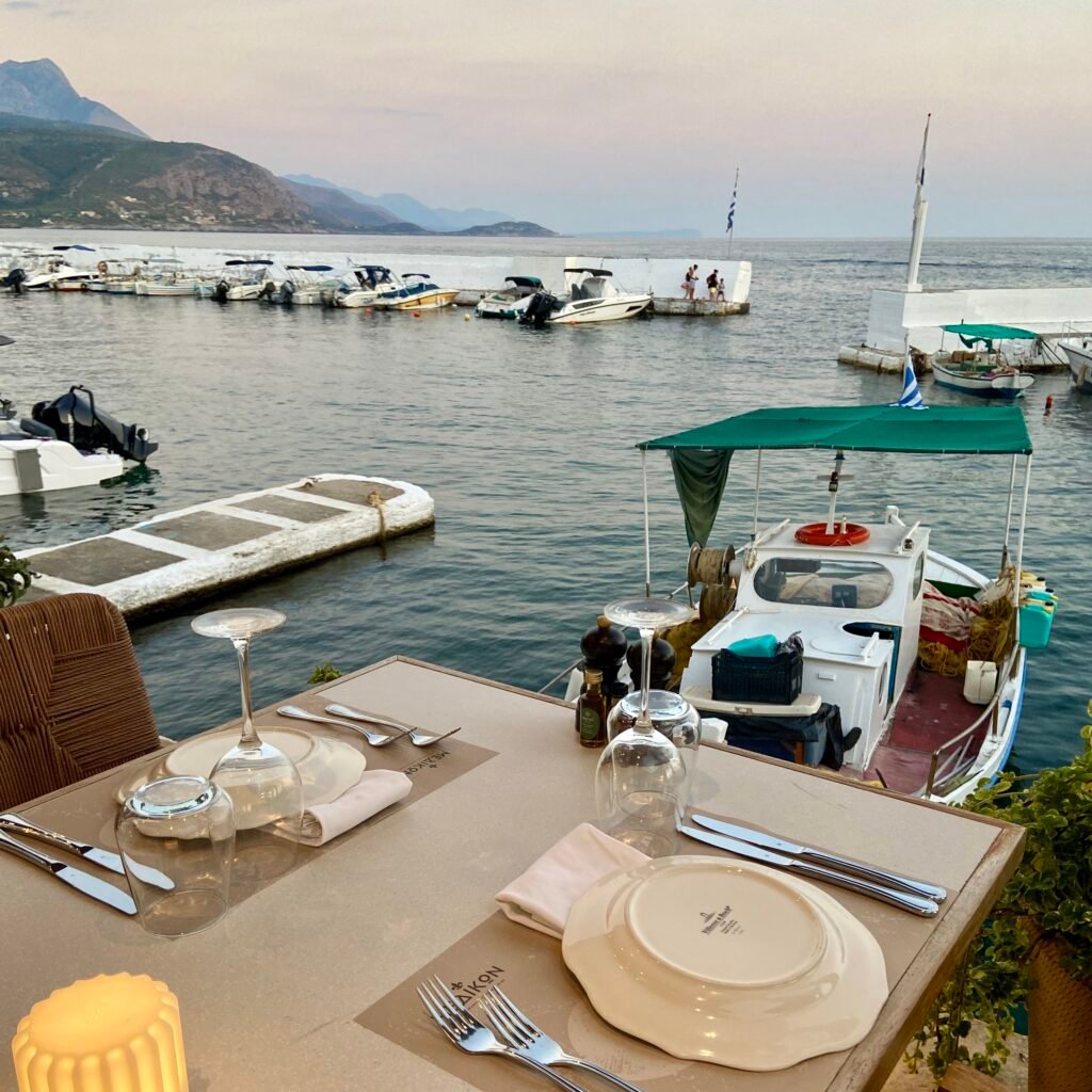 Outdoor dinning area next to port at Medikon in Agios Nikolaos in the Mani Peninsula Peloponnese