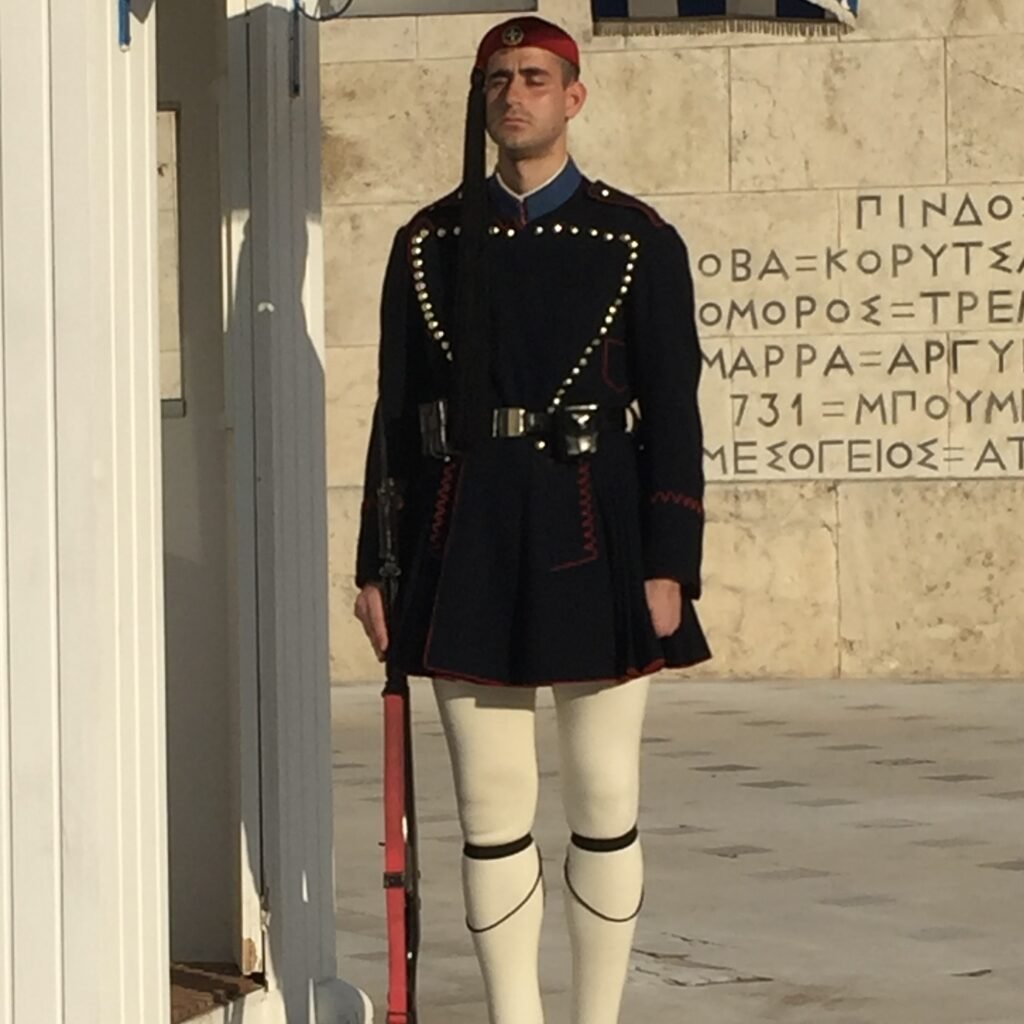 Guards from the Evzones at Tomb of the Unknown Soldier in Syntagma Square Family Guide Athens Greece