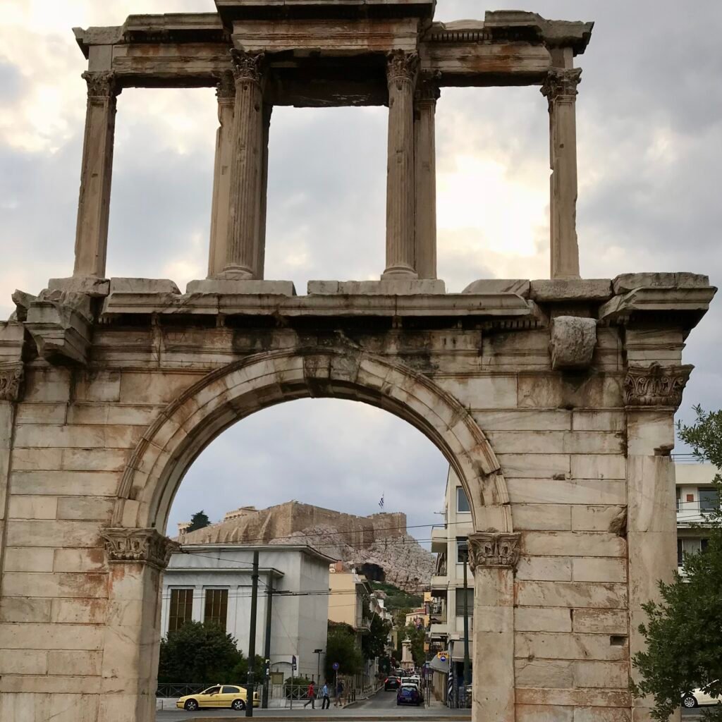 Arch of Hadrian with view of Acropolis Family Guide Athens Greece