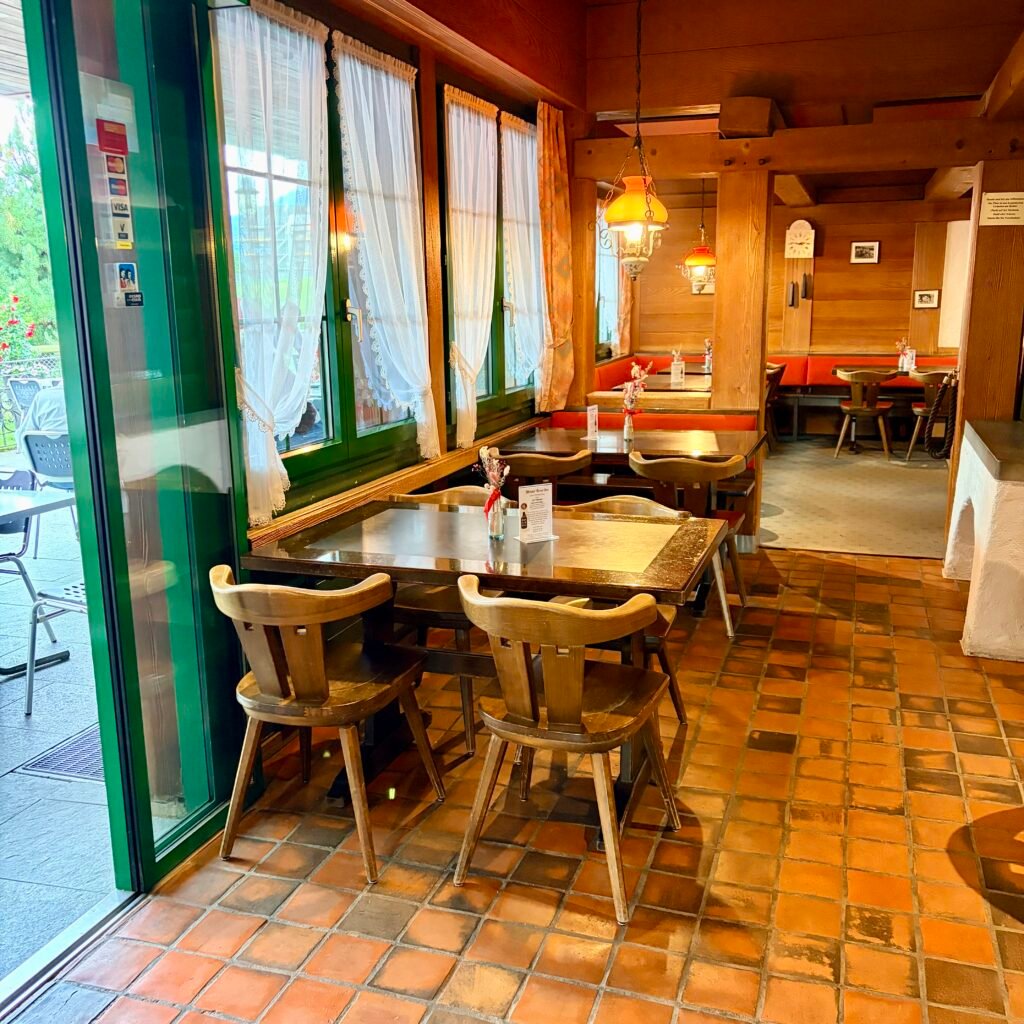 Indoor seating at restaurant at Wirtschaft Trumpf-Buur Family Day Trip Near Lucerne Switzerland